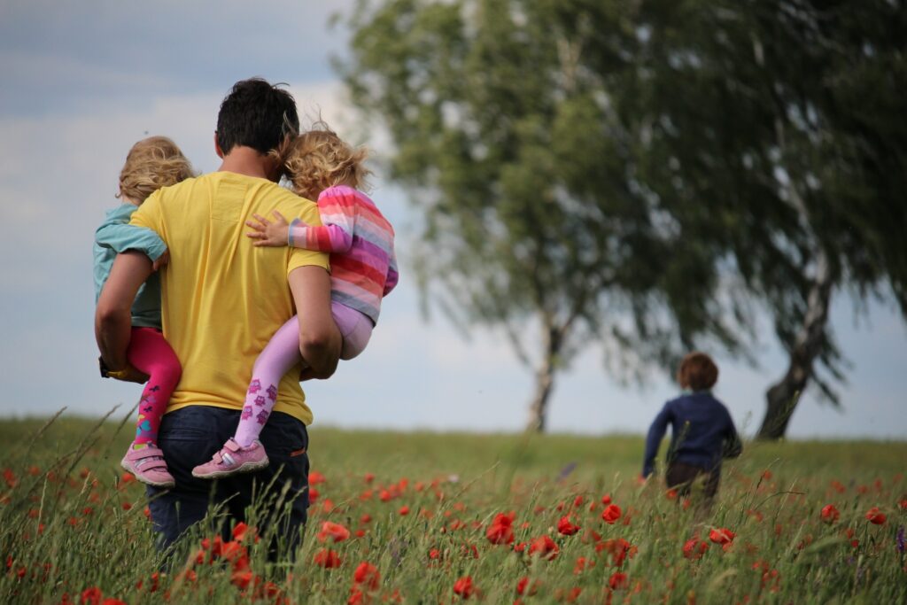 man-kids-playing